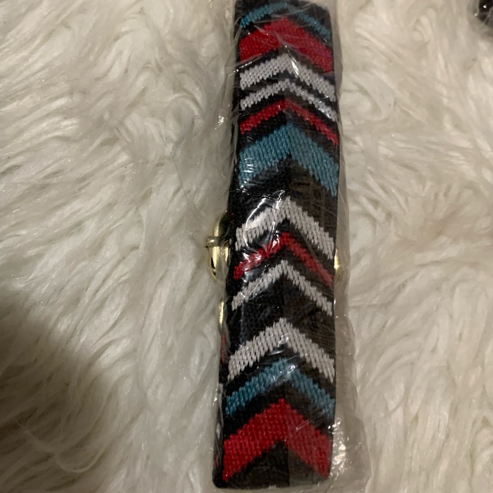 NWOT.  ADJUSTABLE BODY STRAP, Printed